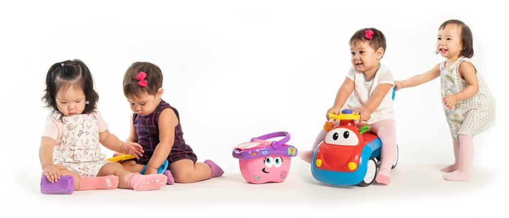 babies playing happy