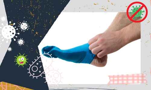 man wearing socks to prevent odor